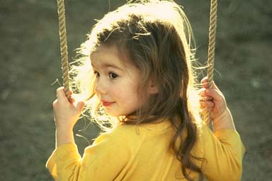 YOUNG
GIRL ON A SWING